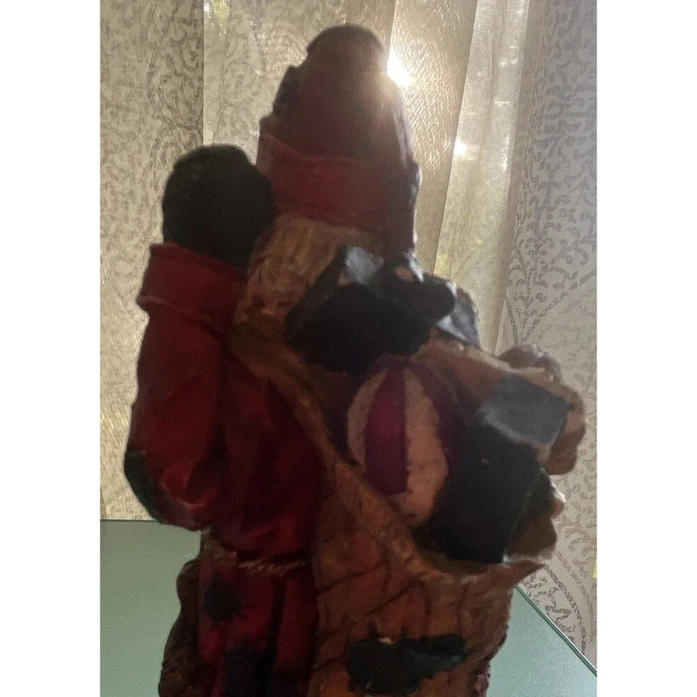 Vintage rustic, resin pencil Santa with toy bag
